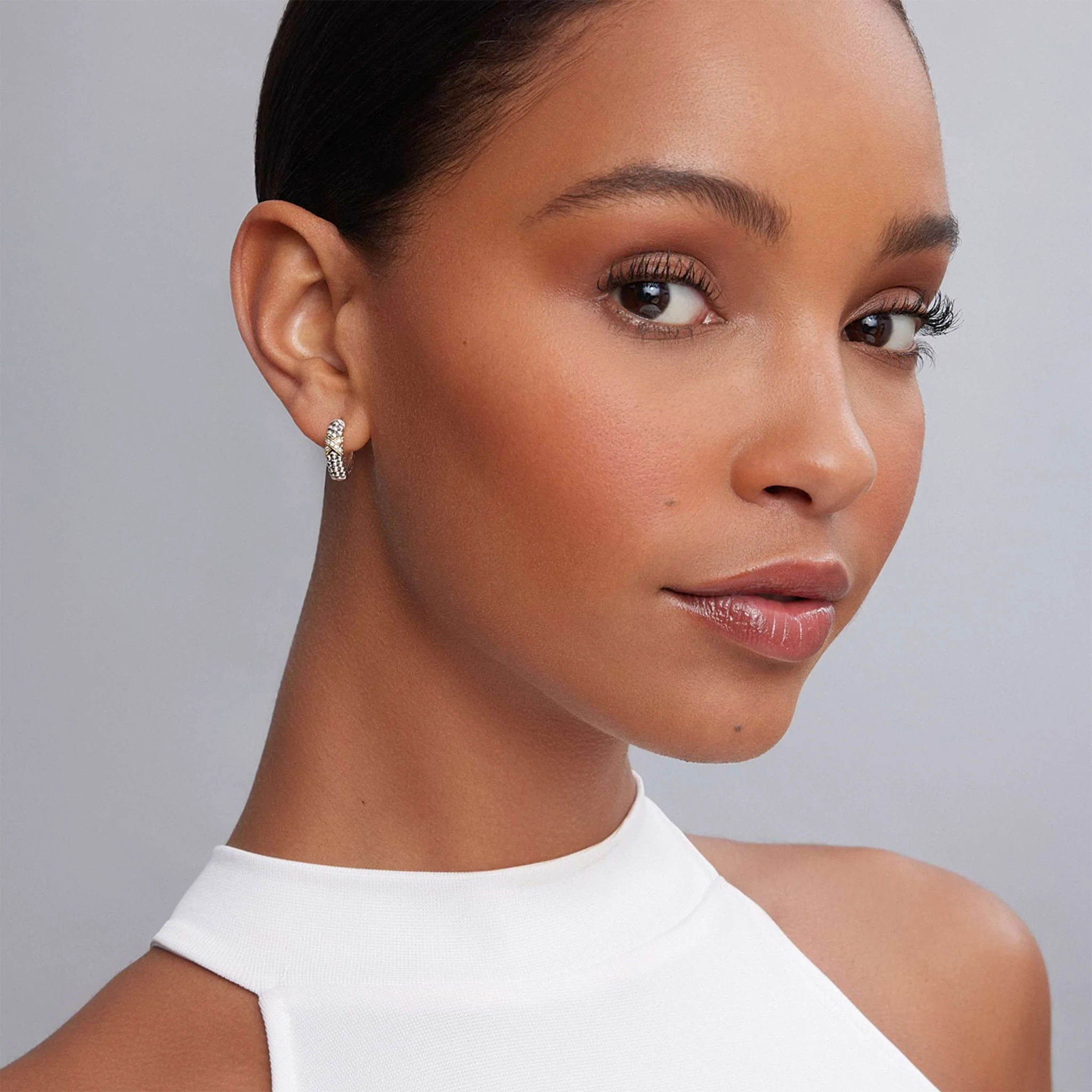 Embrace Two-Tone Diamond Huggie Earrings - Image 2